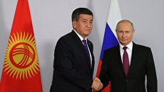 Президент РФ Владимир Путин и президент Киргизии Сооронбай Жээнбеков во время встречи. 14 мая 2018 Президент РФ Владимир Путин и президент Киргизии Сооронбай Жээнбеков во время встречи. 14 мая 2018