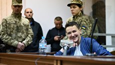 Надежда Савченко во время судебного заседания в Киеве. Архивное фото Надежда Савченко во время судебного заседания в Киеве. Архивное фото