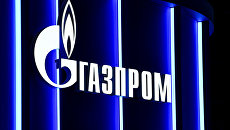 Вывеска компании Газпром. Архивное фото Вывеска компании Газпром. Архивное фото