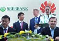Исполнительный директор Huawei Technologies Co.,Ltd. Го Пин и президент, председатель правления ОАО Сбербанк России Герман Греф на Петербургском международном экономическом форуме. 24 мая 2018 Исполнительный директор Huawei Technologies Co.,Ltd. Го Пин и президент, председатель правления ОАО Сбербанк России Герман Греф на Петербургском международном экономическом форуме. 24 мая 2018