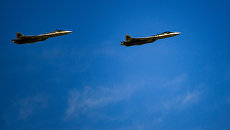 Многофункциональные истребители пятого поколения Су-57. Архивное фото Многофункциональные истребители пятого поколения Су-57. Архивное фото