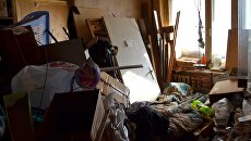 Пожилая женщина спала прямо в горе мусора Пожилая женщина спала прямо в горе мусора