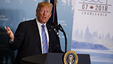 Президент США Дональд Трамп во время пресс-конференции на саммите G7. 9 июня 2018 Президент США Дональд Трамп во время пресс-конференции на саммите G7. 9 июня 2018