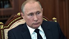 Владимир Путин во время встречи с временно исполняющим обязанности губернатора Кемеровской области Сергеем Цивилёвым. 25 июня 2018 Владимир Путин во время встречи с временно исполняющим обязанности губернатора Кемеровской области Сергеем Цивилёвым. 25 июня 2018