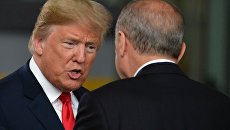 Дональд Трамп и президент Турции Реджеп Тайип Эрдоган на саммите стран-участниц НАТО в Брюсселе. 11 июля 2018 Дональд Трамп и президент Турции Реджеп Тайип Эрдоган на саммите стран-участниц НАТО в Брюсселе. 11 июля 2018