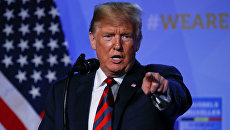 Президент США Дональд Трамп на пресс-конференции после участия в саммите НАТО в Брюсселе, Бельгии. 12 июля 2018 Президент США Дональд Трамп на пресс-конференции после участия в саммите НАТО в Брюсселе, Бельгии. 12 июля 2018