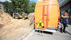 Специалисты Мосгаз на работах по замене газопровода Специалисты Мосгаз на работах по замене газопровода
