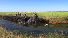 На месте крушения вертолета Ми-2 в Краснодарском крае, в результате которого погибли два человека. 2 августа 2018 На месте крушения вертолета Ми-2 в Краснодарском крае, в результате которого погибли два человека. 2 августа 2018
