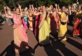 Участники фестиваля индийской культуры, посвященного Дню независимости Индии, в парке Сокольники в Москве Участники фестиваля индийской культуры, посвященного Дню независимости Индии, в парке Сокольники в Москве