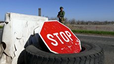 Военнослужащий на блок-посту в Донецкой области Военнослужащий на блок-посту в Донецкой области