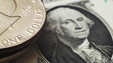 Монета и банкнота номиналом в один доллар США Монета и банкнота номиналом в один доллар США
