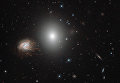 Спиральная галактика NGC 4858 Спиральная галактика NGC 4858