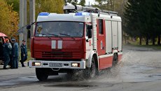 Автомобиль пожарной охраны. Архивное фото Автомобиль пожарной охраны. Архивное фото