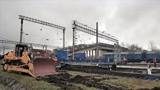 Аварийно-восстановительные работы на месте обрушенного моста в городе Свободном Амурской области Аварийно-восстановительные работы на месте обрушенного моста в городе Свободном Амурской области