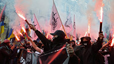 Участники марша националистов по случаю 76-летия создания Украинской повстанческой армии (экстремистская организация, запрещенная в России) в Киеве. 14 октября 2018 Участники марша националистов по случаю 76-летия создания Украинской повстанческой армии (экстремистская организация, запрещенная в России) в Киеве. 14 октября 2018