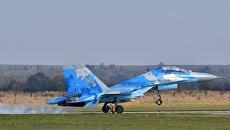 Украинский истребитель Су-27 во время учений Чистое небо - 2018. Архивное фото Украинский истребитель Су-27 во время учений Чистое небо - 2018. Архивное фото