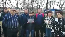 Стоп-кадр видеообращения жителей села Краскино в Приморье Стоп-кадр видеообращения жителей села Краскино в Приморье