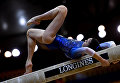 Ирина Алексеева (Россия) выполняет упражнения на бревне на чемпионате мира по спортивной гимнастике в Дохе Ирина Алексеева (Россия) выполняет упражнения на бревне на чемпионате мира по спортивной гимнастике в Дохе