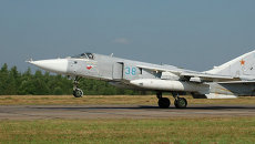 Боевой самолет Су-24. Архивное фото Боевой самолет Су-24. Архивное фото