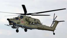 Учебно-боевой вертолет Ми-28УБ. Архивное фото Учебно-боевой вертолет Ми-28УБ. Архивное фото