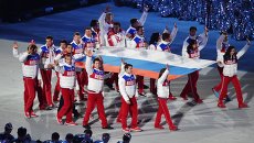 Вынос российского флага во время церемонии закрытия XXII зимних Олимпийских игр в Сочи. Вынос российского флага во время церемонии закрытия XXII зимних Олимпийских игр в Сочи.